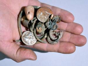 Some of the coins found in Galilee cave. (Shmuel Magal/IAA)