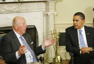 President Obama meets with former secretary of state George Shultz in the Oval Office in May 2009 to discuss nuclear reductions. (AP/Gerald Herbert)
