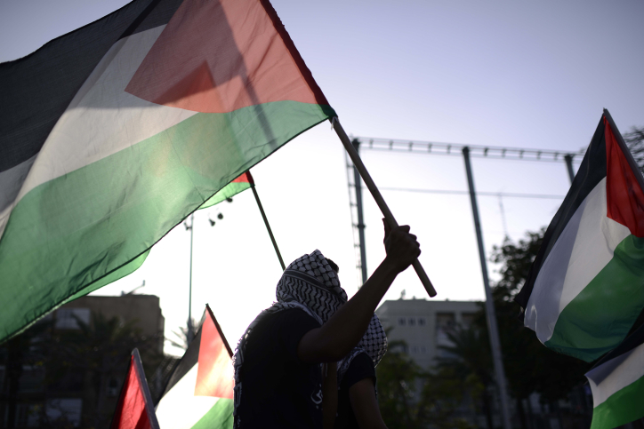 Arab Israelis take part in a rally in Tel Aviv.