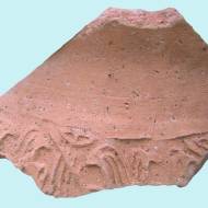 Fragment of cylinder seal impression found at Bet Ha-'Emeq site