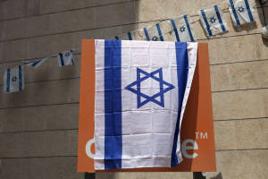 Israeli employees cover Orange logos