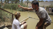 Christian baptisms on both sides of the Jordan River