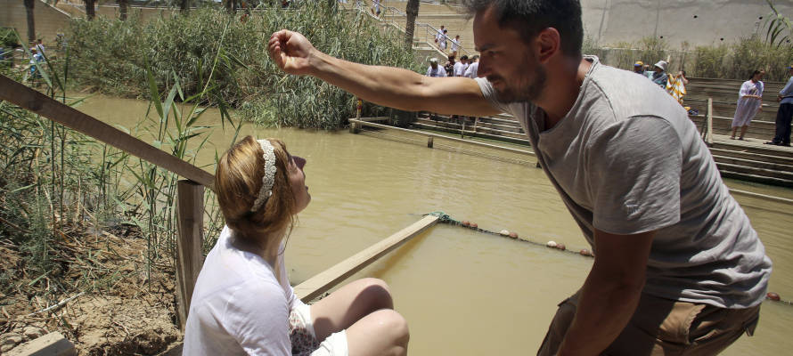 Christian baptisms on both sides of the Jordan River