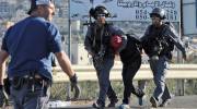 Israeli police arrest an Arab assailant.