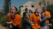 Jewish settlers cry as a soldier forces them to evacuate their home in the Jewish settlement of Neve Dekalim. Photo by Flash90