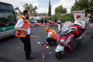 Medics at the scene of the Jerusalem terror attack. (Yonatan Sindel/Flash90)