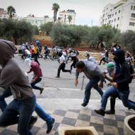 Palestinian protesters riot and throw rocks at Israeli security forces