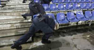 Security check after evacuation of Hanover soccer stadium due to Islamic terror threats. (AP/Markus Schreiber)