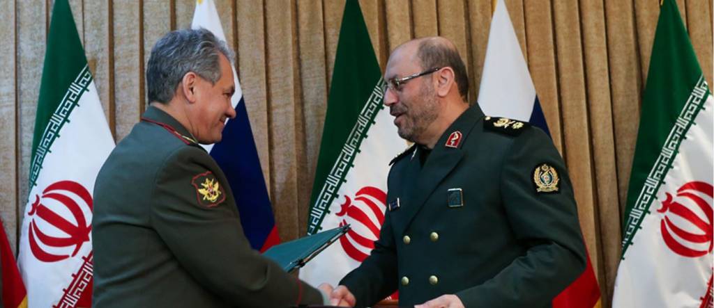 Iranian Defense Minister Sergei Shoigu (L) and Defense Minister Hossein Dehghan.