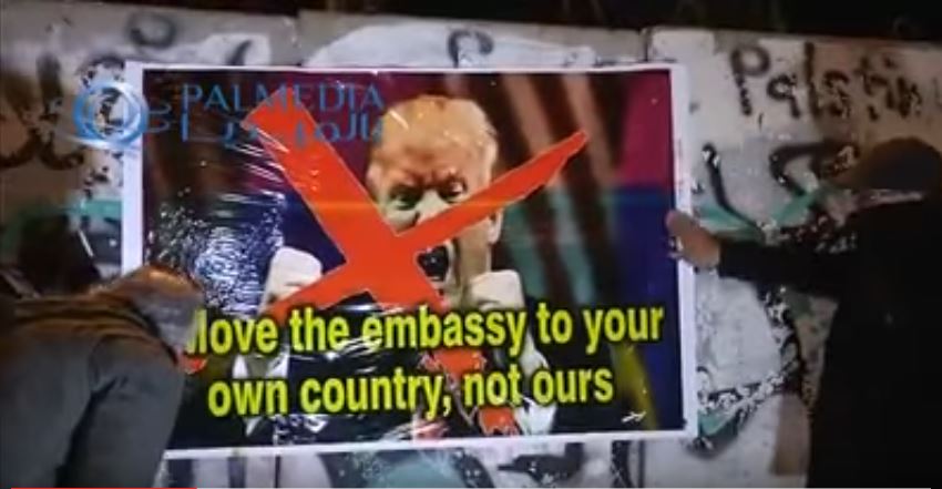 Palestinians burn Trump posters