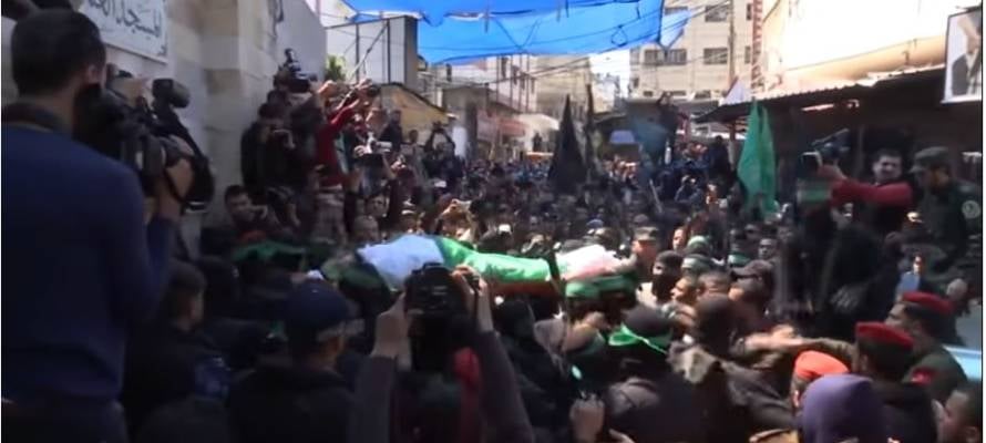 Thousands give Hamas terrorist a hero's funeral