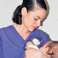 Jewish nurse feeds palestinian baby