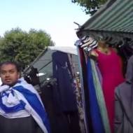 Zionist wears Israeli flag in London