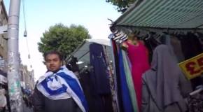 Zionist wears Israeli flag in London