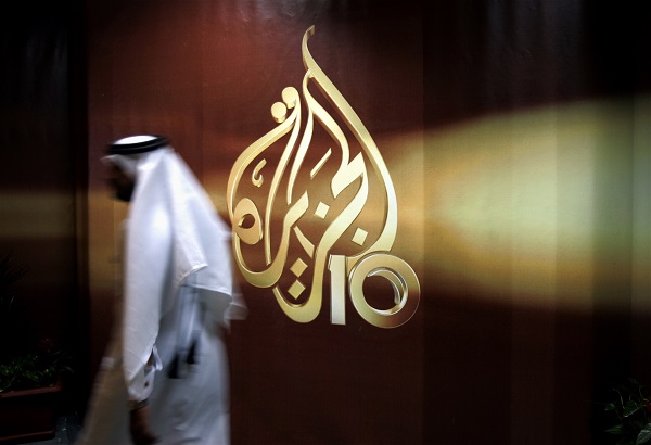 An Al-Jazeera employee in Qatar. (AP Photo/Kamran Jebreili, File)