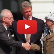 Israeli Prime Minister Yitzchak Rabin shakes hands with arch-terrorist Yasser Arafat at the Oslo Accords signing. (AP)