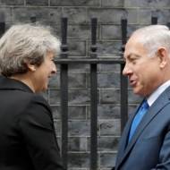 British Prime Minister Theresa May greets Israeli Prime Minister Benjamin Netanyahu. (AP Photo/Matt Dunham)