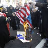 Iranians burn a U.S. flag. (AP Photo/Vahid Salemi, File)