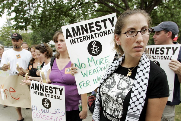 An Amnesty International demonstration. (AP Photo/Manuel Balce Ceneta)