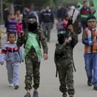 Palestinian children dressed as terrorists. (AP/Adel Hana)