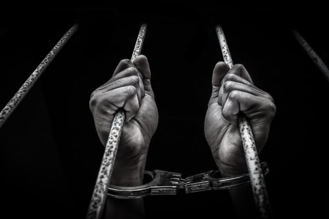 prison torture handcuffs