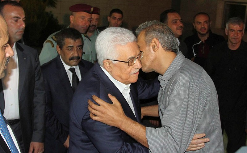 Abbas embraces terrorist