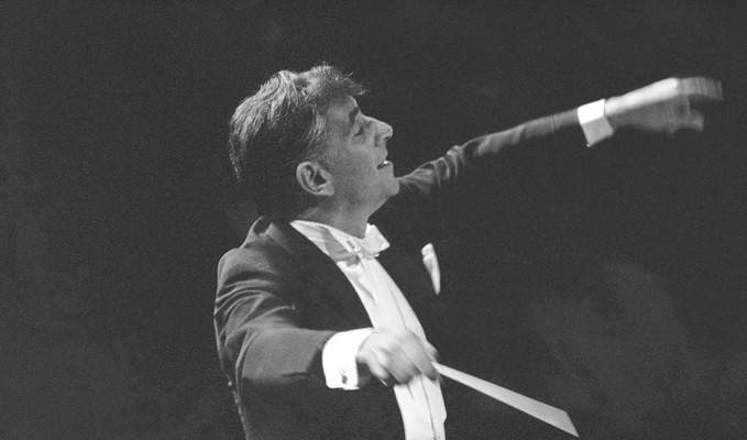 In this Sept. 24, 1962 file photo Leonard Bernstein leads the New York Philharmonic Orchestra in the inaugural concert in New York's new Philharmonic Hall.