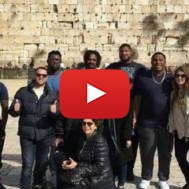 NFL football players at the Western Wall