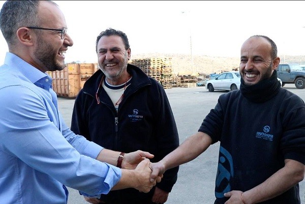 Calev Myers with Palestinian Workers