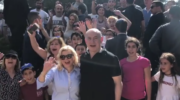 The Israeli prime minister and his wife celebrating Independence Day with other Israelis. (screenshot)