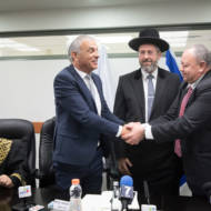 Israel's Chief Rabbis and Hussein Jaber (R) before Passover. (Miriam Alster/Flash90)