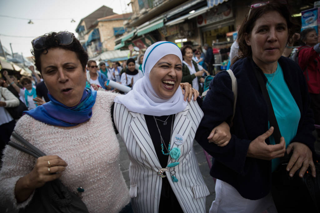 Jewish and Muslim women in Jerusalem, during a demonstration calling for peace. (Hadas Parush/Flash90)