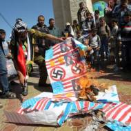 Palestinians burn US flags