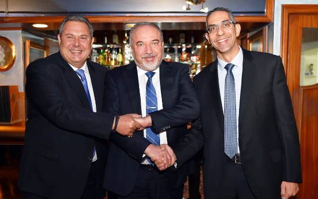 Greek Defense Minister Panos Kammenos (L) and his Israeli and Cypriot counterparts Avigdor Liberman (C) and Savvas Angelides