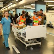 Transferring patients from the main hospital to the underground hospital