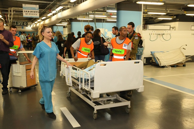 Transferring patients from the main hospital to the underground hospital
