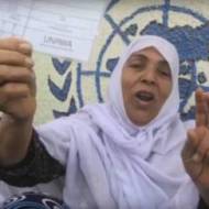 A "Palestinian refugee" and her UNRWA card. (Screenshot)