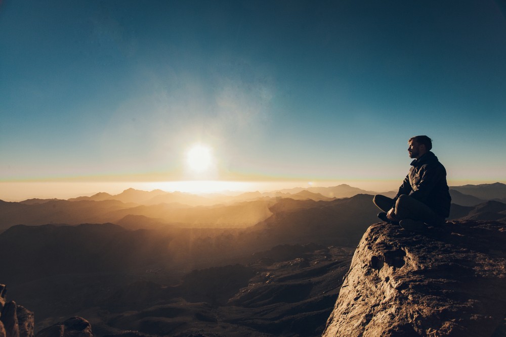 man alone sunset