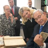 Benjamin and Sara Netanyahu at the National Library of Lithuania. (Amos Ben-Gershom/GPO)