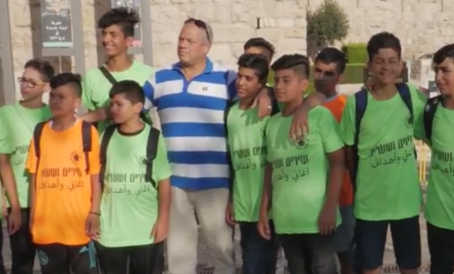 Israeli and Arab youth gather for a soccer tournament. (screenshot)