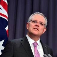 Prime Minister Scott Morrison, left, speaks to the media alongside Minister for Foreign Affairs Marise Payne during a press conference at the Parliament House in Canberra, Tuesday, October 16, 2018. Morrison said Tuesday that he was open to shifting the Australian Embassy from Tel Aviv to Jerusalem in line with President Donald Trump's decision to recognize the contested holy city as Israel's capital. (Mick Tsikas/AAP Image via AP)