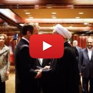 Macron greets Rouhani