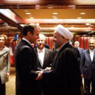 Macron greets Rouhani