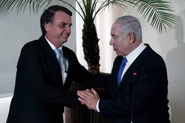 Brazil's President-elect Jair Bolsonaro, left, and Israel's Prime Minister Benjamin Netanyahu. (Leo Correa/Pool Photo via AP)