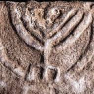 The seven-branched menorah on a large stone slab found in Tiberias. (Tal Rogovski)