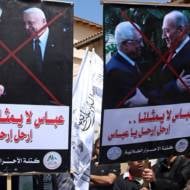 Pro-Hamas protesters hold protest Fatah's Mahmoud Abbas. (AP Photo/Adel Hana)