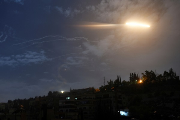 Israeli missiles striking an Iranian target in Syria. (SANA via AP)