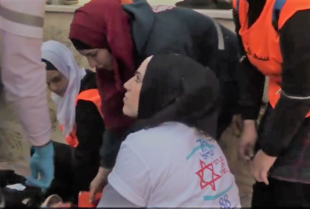 Arab volunteers train to save lives. (screenshot)