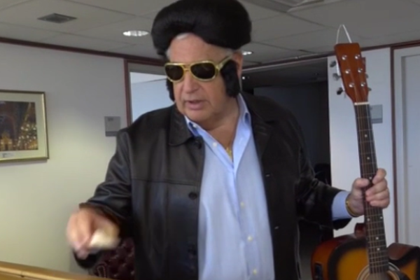 Ambassador Friedman dressed as Elvis for Purim. (screenshot)