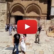 Tourists visit Church of the Holy Sepulchre in Jerusalem's Old City.